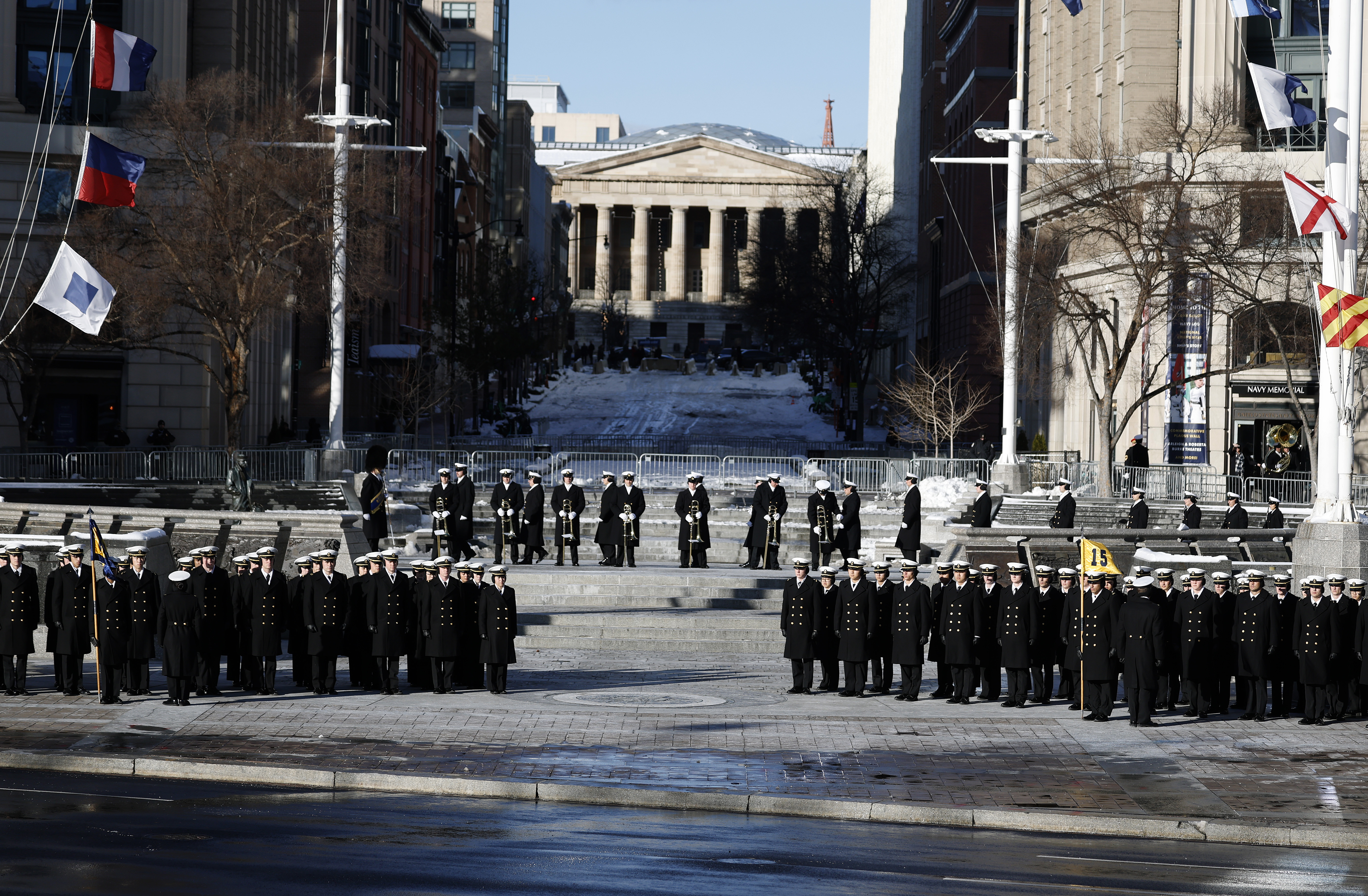 Members of the U.S. Navy await Carter’s casket at the U.S. Navy Memorial.