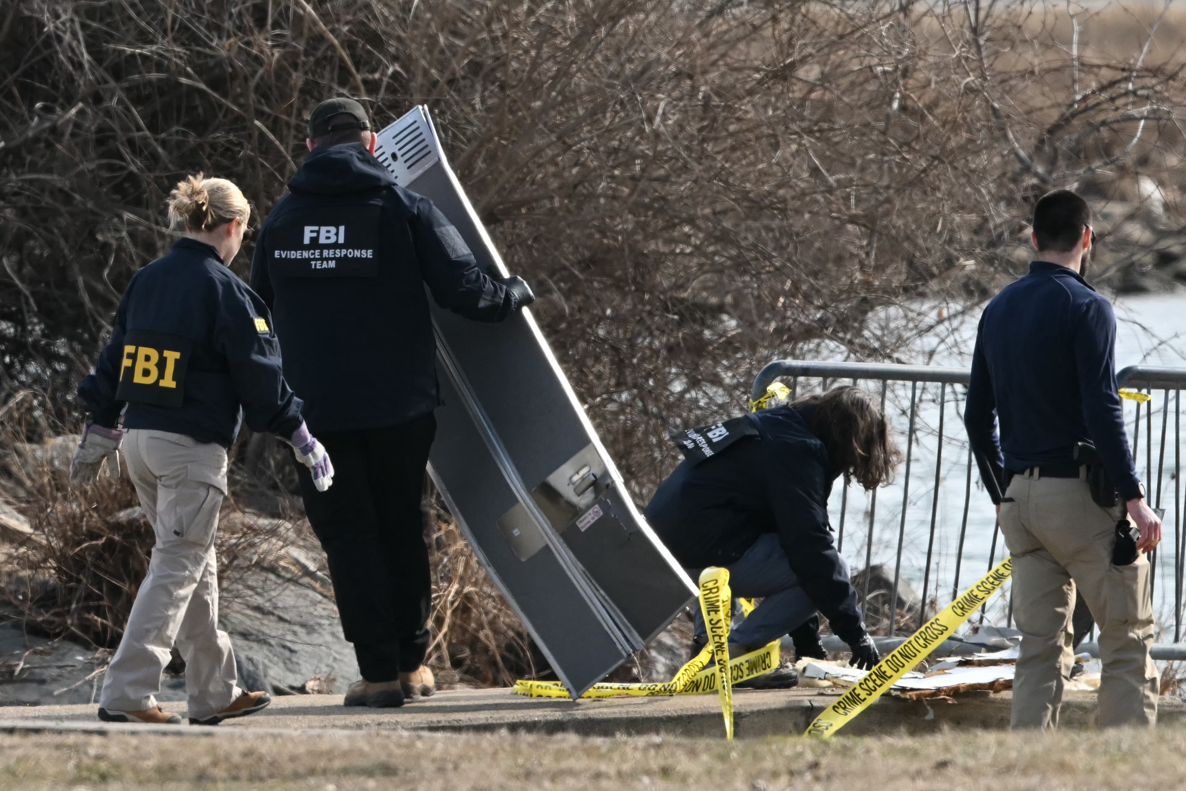 Photos See aftermath of plane, helicopter crash in Potomac River NBC