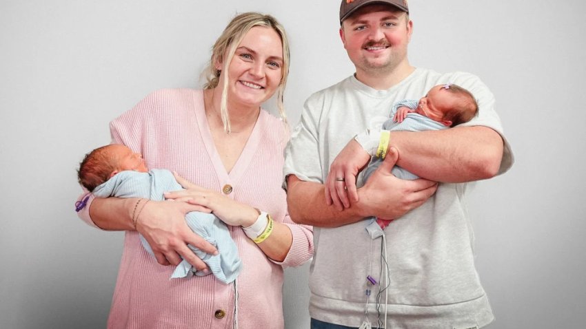 Morgan Hughes with her husband, Sam Hughes, and their twins.