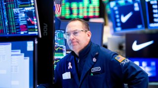 Traders work on the floor of the New York Stock Exchange on Feb. 6, 2025.