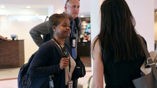 Associated Press White House reporter Darlene Superville and AP photographer Ben Curtis are told by a U.S. President Donald Trump administration member that they have been denied from joining the White House press pool in West Palm Beach, Florida, U.S., February 15,  2025. 