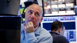 A trader works on the floor at the New York Stock Exchange on Feb. 24, 2025.