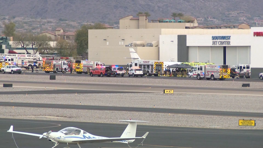 At least one dead after private jets collide in Arizona