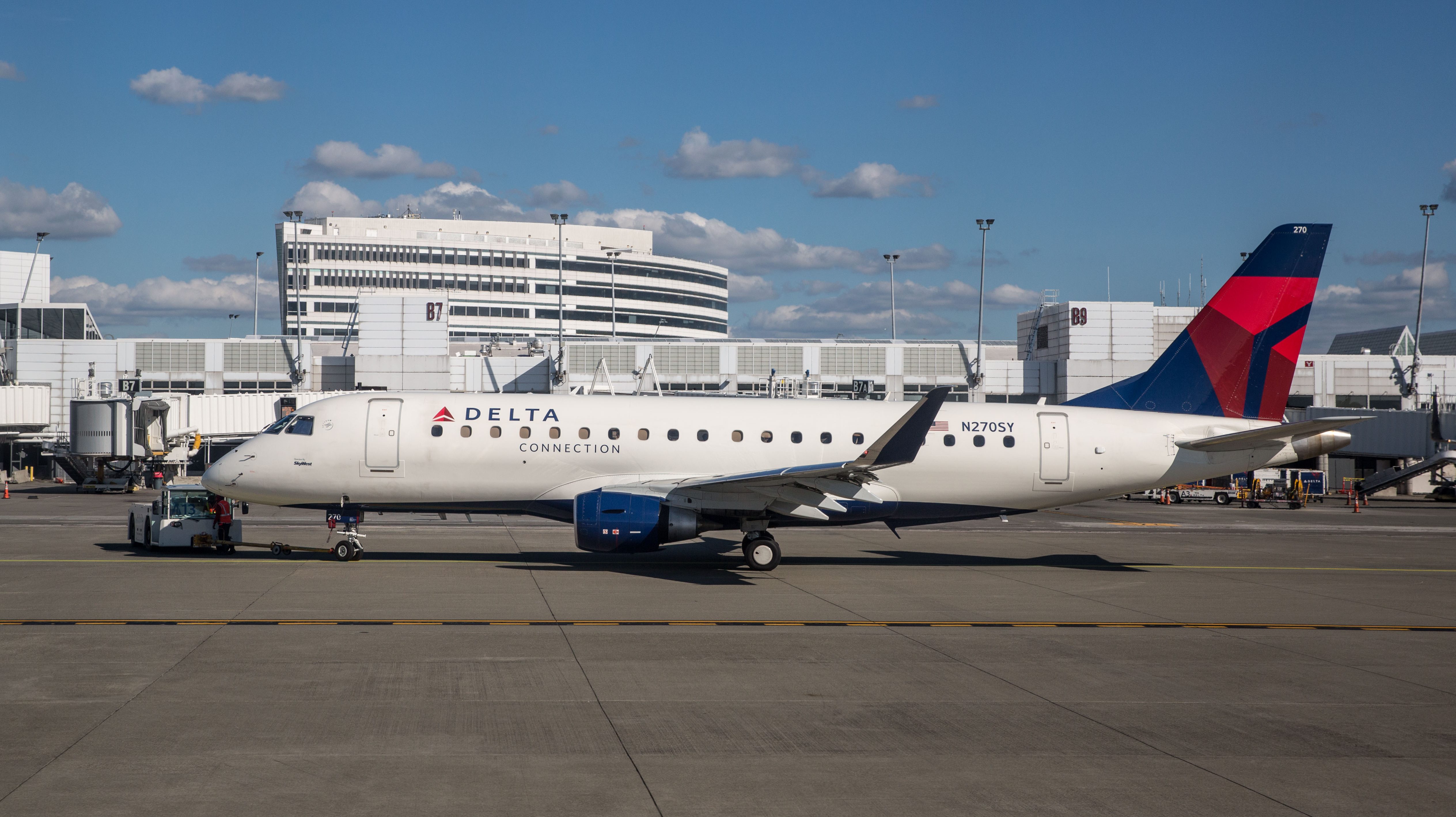 Parked Delta plane struck by Japan Airlines plane at Seattle
