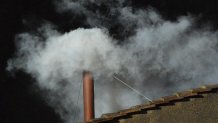 White smoke rises from the chimney on the roof of the Sistine Chapel meaning that cardinals elected a new pope on the second day of their secret conclave on  March 13, 2013 at the Vatican.    AFP PHOTO / VINCENZO PINTO        (Photo credit should read VINCENZO PINTO,VINCENZO PINTO/AFP via Getty Images)