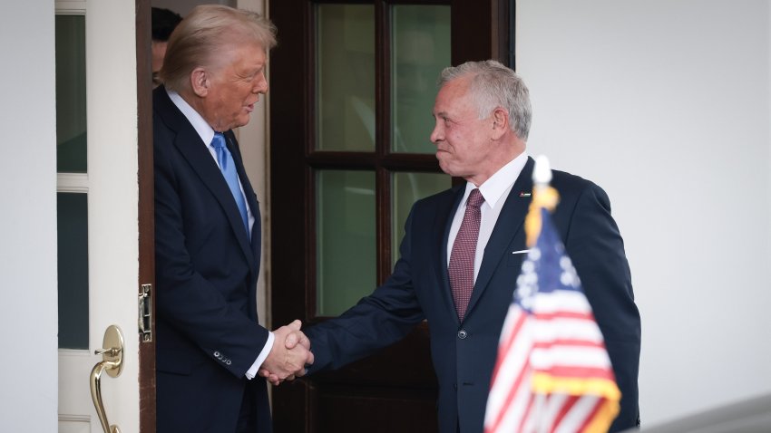 U.S. President Donald Trump shakes hands with Jordan’s King Abdullah II