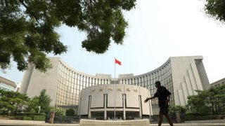 A man walks past the People’s Bank of China (PBOC) building on July 20, 2022 in Beijing, China.