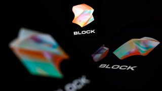 In this photo illustration, the logo for the US tech firm “Block” is displayed and reflected in a number of digital screens on March 03, 2023 in London, England.