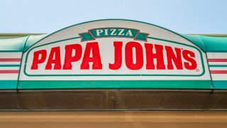 The Papa John’s Pizza logo is shown on May 09, 2024 in Austin, Texas.