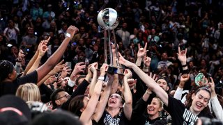 The New York Liberty celebrate after winning the 2024 WNBA Finals at Barclays Center.