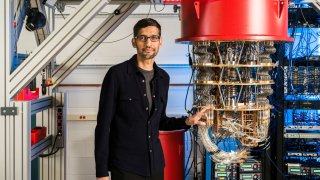 A handout picture from October 2019 shows Sundar Pichai with one of Google’s Quantum Computers in the Santa Barbara lab, California, U.S. Picture taken in October 2019.      Google/Handout via REUTERS        THIS IMAGE HAS BEEN SUPPLIED BY A THIRD PARTY.