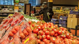 A employee stocks shelves at the Maple Leaf Gardens Loblaws. Trump administration tariffs set to begin on February 4th would affect prices and the availability of some products at grocery stores.
