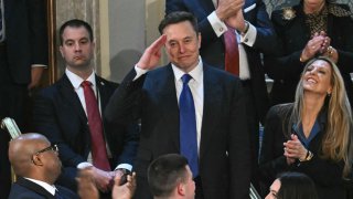 Elon Musk stands as he is recognized by U.S. President Donald Trump during Trump’s address to a joint session of Congress at the US Capitol in Washington, DC, on March 4, 2025.
