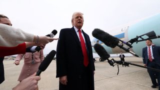 U.S. President Donald Trump speaks to reporters before boarding Air Force One as he departs from Joint Base Andrews in Maryland, D.C., on March 14, 2025.