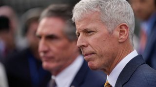 U.S. Secretary of Energy Chris Wright and U.S. Secretary of the Interior Doug Burgum speak with members of the media outside of the West Wing of the White House, in Washington, D.C., U.S., March 19, 2025. 