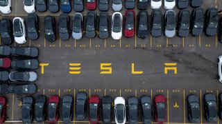 An aerial view of a Tesla showroom in Hamilton, Canada, on March 20, 2025.