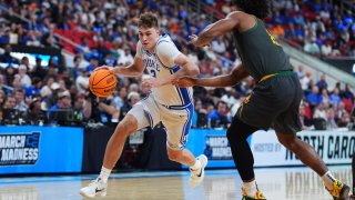 Cooper Flagg #2 of the Duke Blue Devils moves the ball against the Baylor Bears during the second round of the 2025 NCAA Men’s Basketball Tournament held at Lenovo Center on March 23, 2025 in Raleigh, North Carolina.