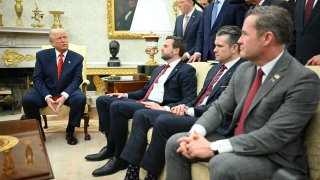US President Donald Trump speaks to the press as he meets with NATO Secretary General Mark Rutte in the Oval Office of the White House in Washington, DC, on March 13, 2025 as, seated from L to R, Vice Presient JD Vance, Defense Secretary Pete Hegseth and National Security Advisor Mike Waltz.