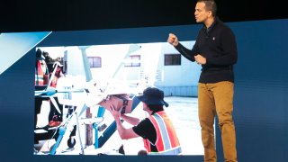 Vin Gupta, then-chief medical officer at Amazon Pharmacy, speaks during Amazon’s “Delivering the Future” event at the company’s BFI1 Fulfillment Center, Robotics Research and Development Hub in Sumner, Washington, on Oct. 18, 2023.