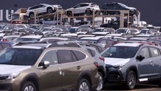Newly manufactured cars awaiting export are parked at a port in Yokohama, south of Tokyo, Japan, on March 27, 2025.