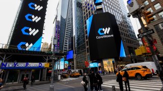 CoreWeave Inc. signage during the company’s initial public offering at the Nasdaq MarketSite in New York, US, on Friday, March 28, 2025. 
