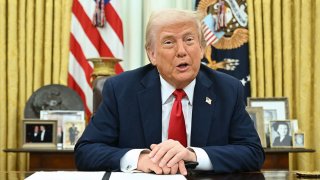 US President Donald Trump speaks as he signs an executive order in the Oval Office of the White House in Washington, DC, on March 31, 2025. 