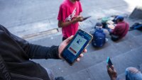 FILE - A Venezuelan migrant shows the U.S. Customs and Border Protection (CBP) One app on his cell phone in Mexico City, Monday, Jan. 20, 2025.