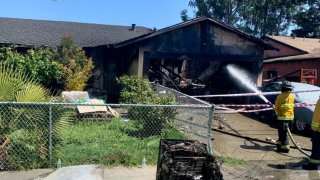 Firefighters battles a blaze at a home in San Jose. (April 8, 2025)
