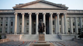 The statue of Albert Gallatin stands outside the U.S. Department of the Treasury building in Washington, D.C.