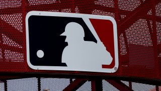 A Major League Baseball logo at Angel Stadium in Anaheim, California, on May 22, 2022.