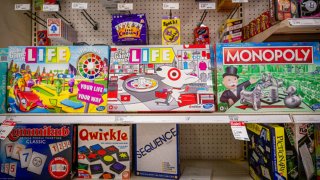 Hasbro board games are seen for sale at a Target store in Austin, Texas, on Dec. 12, 2023.