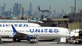 United Airlines planes land and prepare to take off at Newark Liberty International Airport in Newark, New Jersey, , U.S., January 27, 2025. 