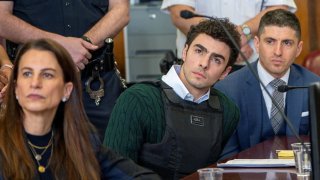 Luigi Mangione, the suspect in the killing of UnitedHealth Group chief executive Brian Thompson, appears in Manhattan Supreme Court on New York state murder and terrorism charges in New York City, U.S., Feb. 21, 2025.