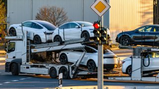 Tesla Model Y electric vehicles are collected from the Tesla Gigafactory Berlin-Brandenburg by a car transporter. 