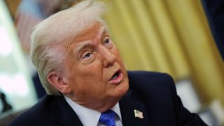 U.S. President Donald Trump delivers remarks in the Oval Office at the White House, in Washington, D.C., U.S., March 21, 2025. 