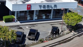 An aerial view of a Tesla showroom on April 02, 2025 in Corte Madera, California.