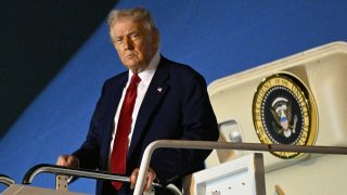 US President Donald Trump steps off Air Force One upon arrival at Palm Beach International Airport in West Palm Beach, Florida on April 3, 2025.
