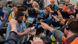 Traders work in the S&P 500 Index (SPX) options pit at the Cboe Global Markets exchange in Chicago, Illinois, US, on Tuesday, April 8, 2025.