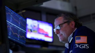A trader works during the closing bell, on the floor at the New York Stock Exchange (NYSE) in New York City, U.S., April 10, 2025. 