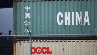 A China Shipping cargo container sits stacked at the Port of Long Beach in Long Beach, California on April 10, 2025. 