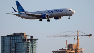 A United Airlines Boeing 737 MAX 9 airplane approaches San Diego International Airport on April 8, 2025 in San Diego, California, U.S.
