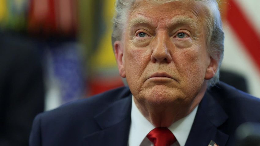U.S. President Donald Trump looks on, as he signs executive orders in the Oval Office at the White House in Washington, D.C., U.S., April 23, 2025.