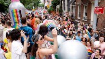 The Garnier float crew rides the pride float at the Garnier x Heritage Of Pride 2023 NYC Pride March