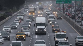 BERKELEY, CALIFORNIA - MARCH 29: A truck travels along Interstate 80 on March 29, 2024 in Berkeley, California. The Environmental Protection Agency (EPA) has finalized a set of strict emissions standards for heavy-duty trucks, buses and other large vehicles in an effort to clean up some of the sources of greenhouse gases. The new rules will apply to model years 2027 through 2032 and will prevent nearly one billion tons of greenhouse gas emissions over the next thirty years.