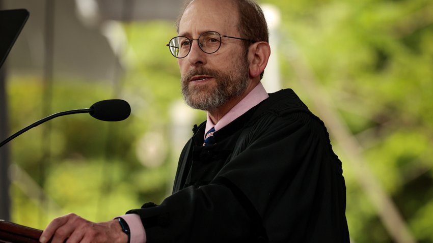 FILE - Alan Garber addresses the crowd during the 373rd Commencement at Harvard University.