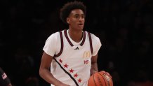 Apr 1, 2025; Brooklyn, NY, USA; McDonald's All American West guard Alijah Arenas (16) dribbles the ball during the first half of the game McDonald's All American East at Barclays Center. Mandatory Credit: Pamela Smith-Imagn Images
