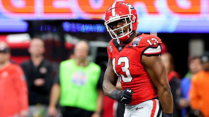 ATLANTA, GEORGIA – DECEMBER 31: Mykel Williams #13 of the Georgia Bulldogs reacts after a sack during the second quarter against the Ohio State Buckeyes in the Chick-fil-A Peach Bowl at Mercedes-Benz Stadium on December 31, 2022 in Atlanta, Georgia. (Photo by Kevin C. Cox/Getty Images)