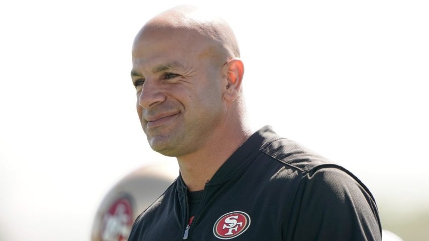 Jul 27, 2019; Santa Clara, CA, USA; San Francisco 49ers defensive coordinator Robert Saleh watches the players warm up before team drills at the SAP Performance Facility. Mandatory Credit: Stan Szeto-USA TODAY Sports