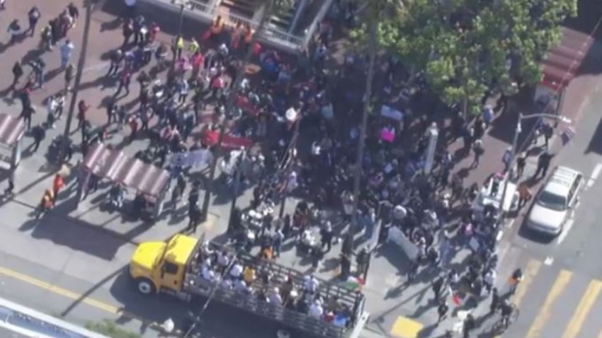 A May Day rally underway at the 24th and Mission BART plaza in San Francisco. (May 1, 2025)