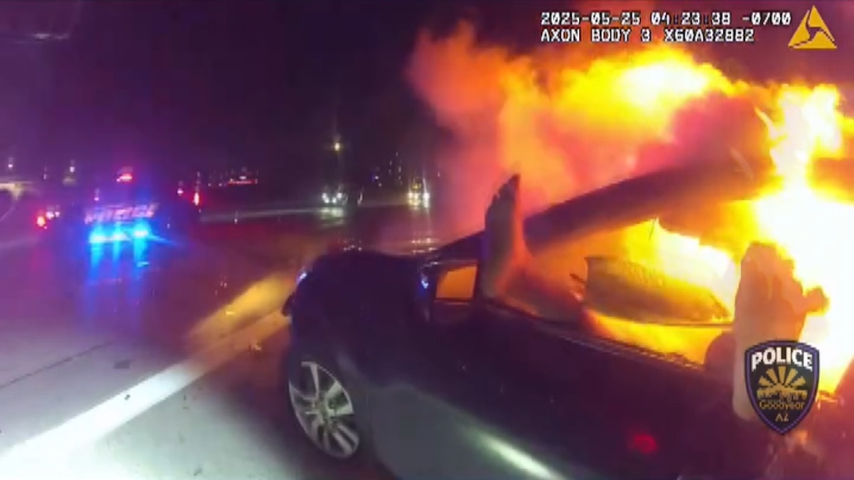 Video shows officer saving woman trapped in burning vehicle NBC Bay Area